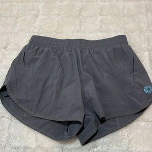Dark gray Athletic shorts with built in Spanx and pockets.